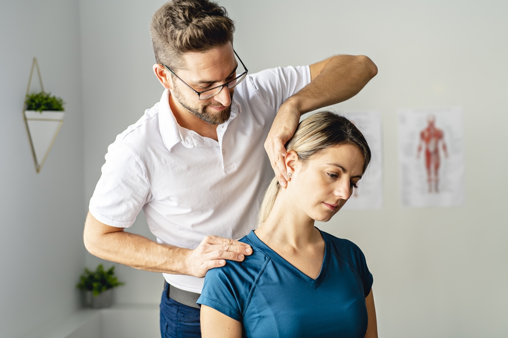 Physiotherapist working with a patient